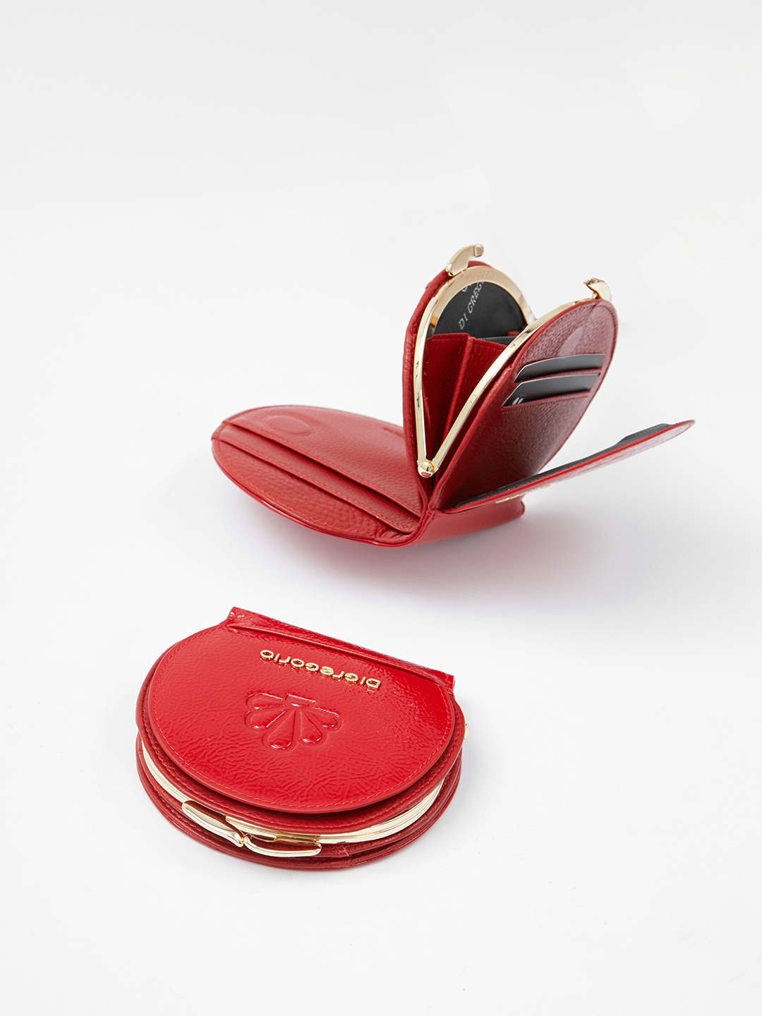 Полукруглый кошелёк с рельефным рисунком от Di Gregorio в красном цвете