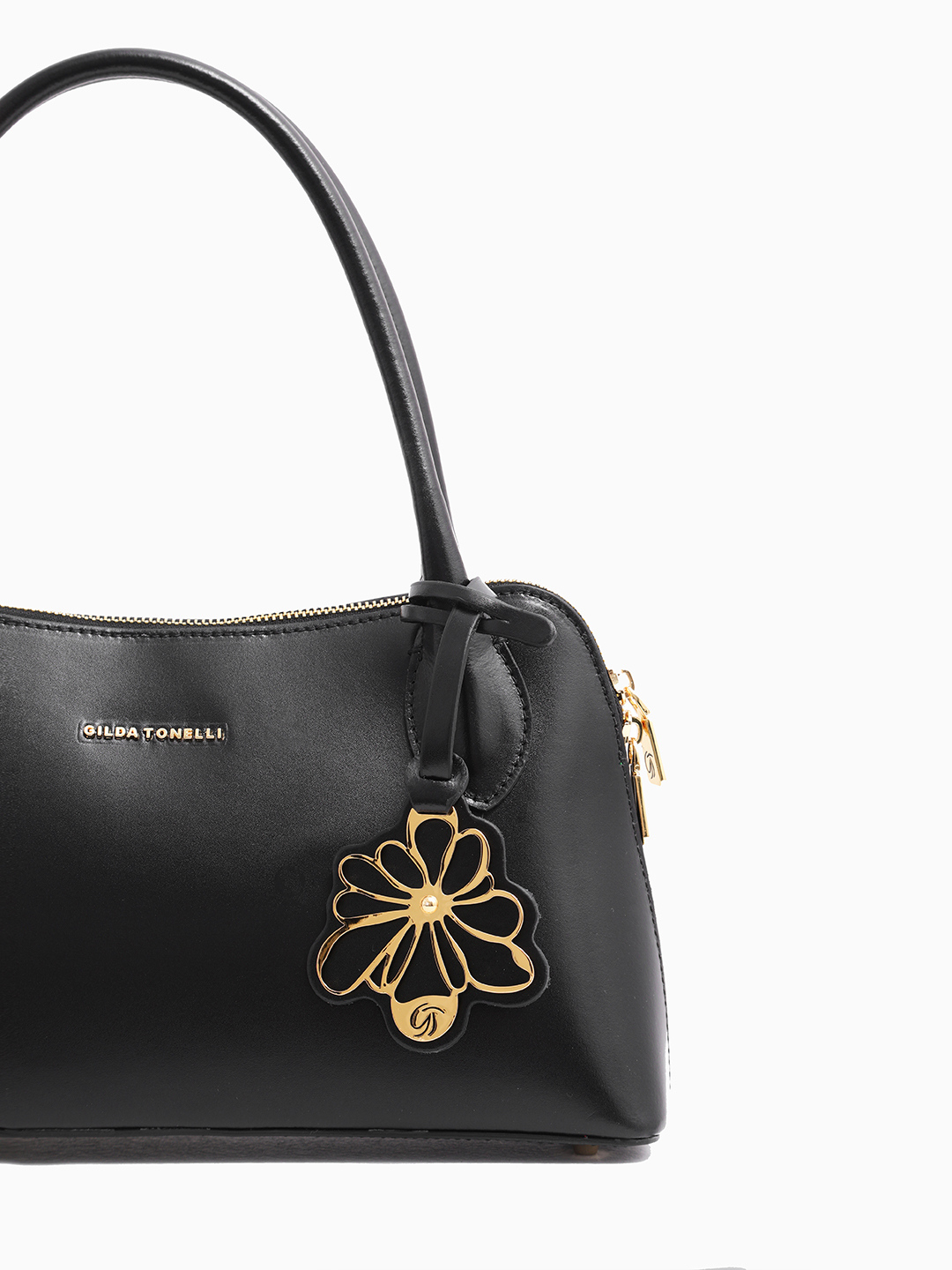 Сумка-багет с фирменным брелоком в виде цветка от Gilda Tonelli в чёрном цвете