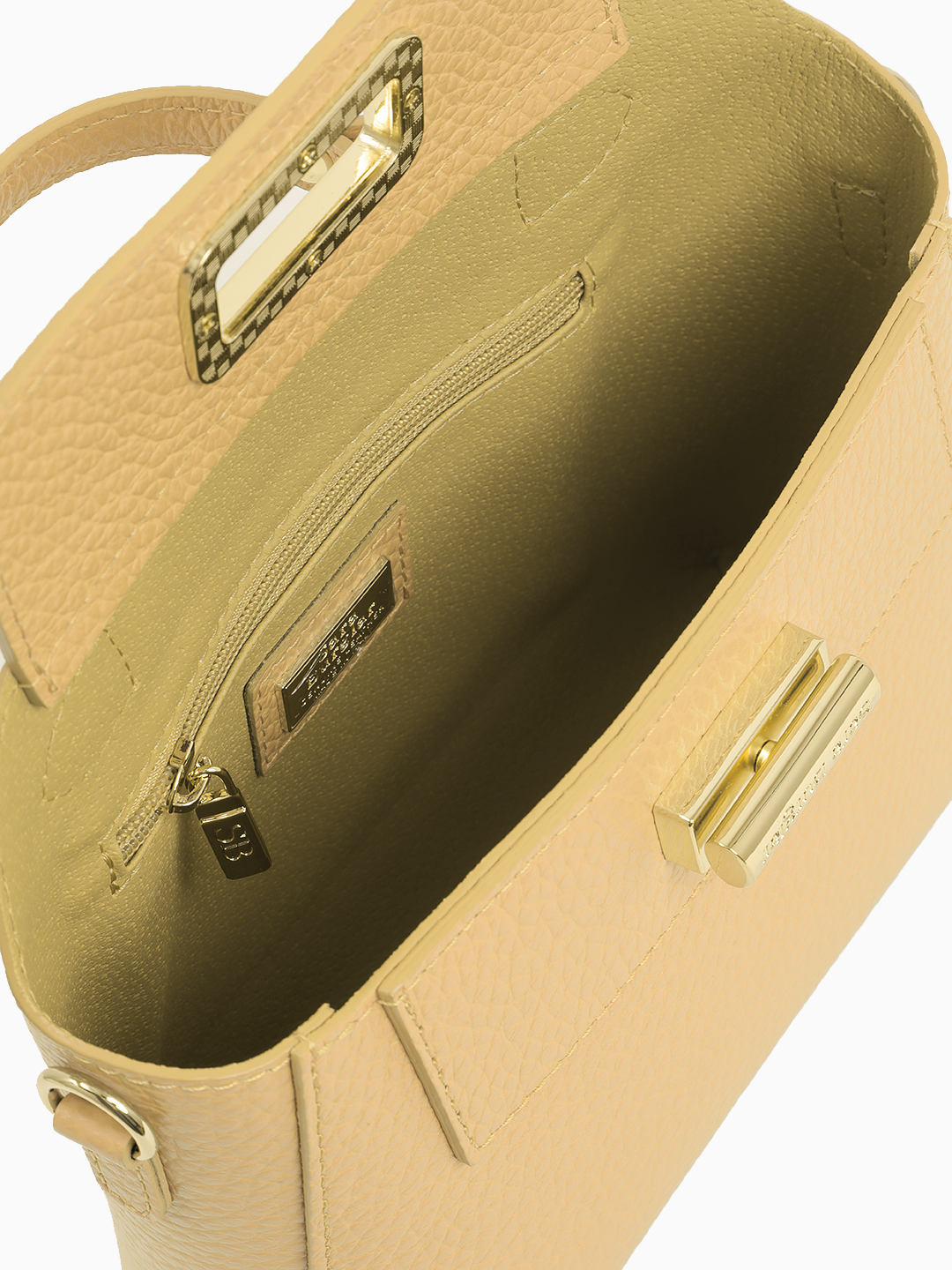 Сумка-cэтчел с гравировкой на поворотной фурнитуре от Sara Burglar в кремовом оттенке