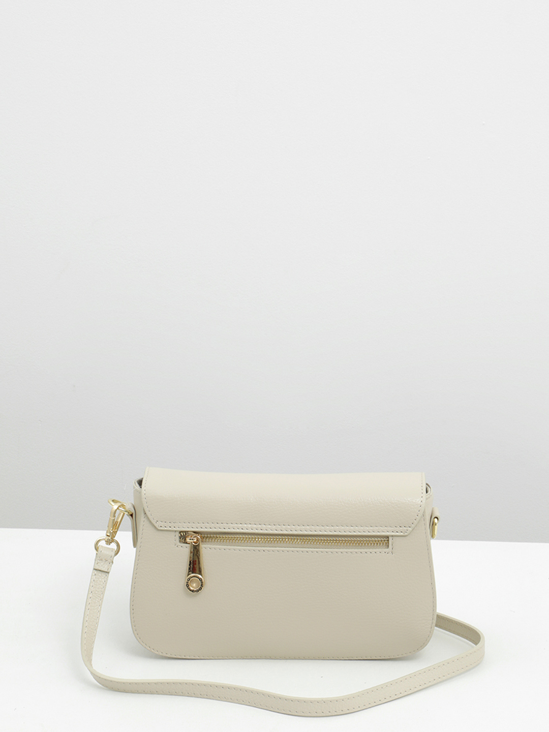 Небольшая кросс-боди с декоративной фурнитурой от Di Gregorio в бежевом оттенке