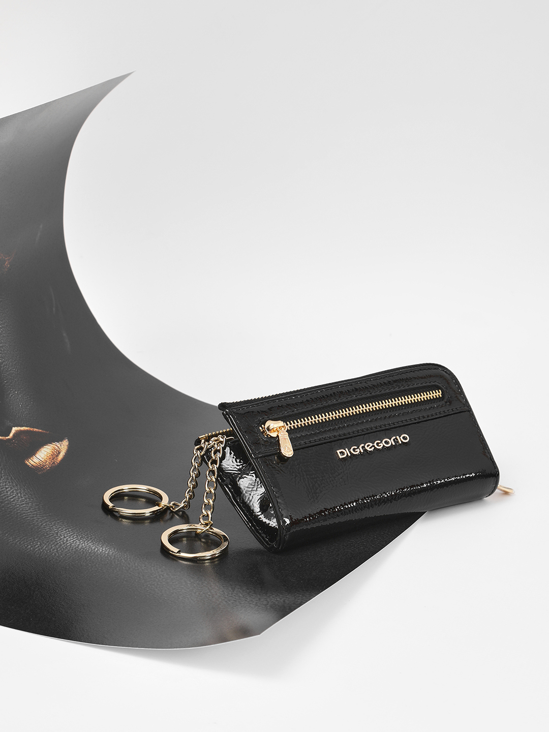 Ключница с металлическим логотипом Di Gregorio из лаковой кожи чёрного цвета