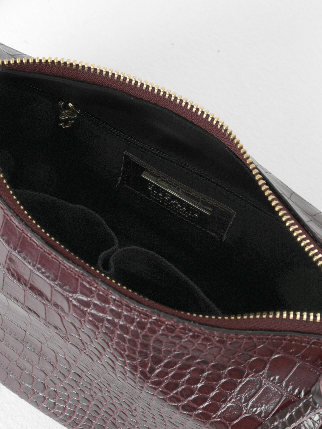 Мешок с сумкой-ручкой от RIPANI в бордовой коже со штампом под крокодила