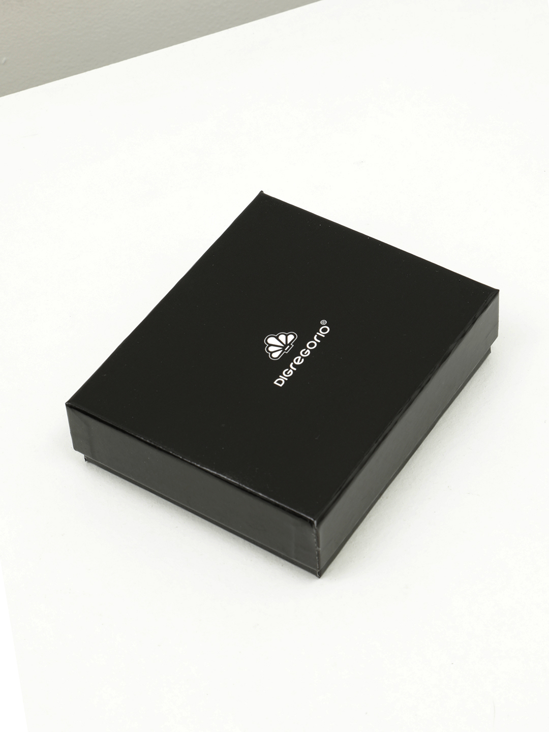 Мужское портмоне от Di Gregorio из крупнозернистой кожи черного цвета