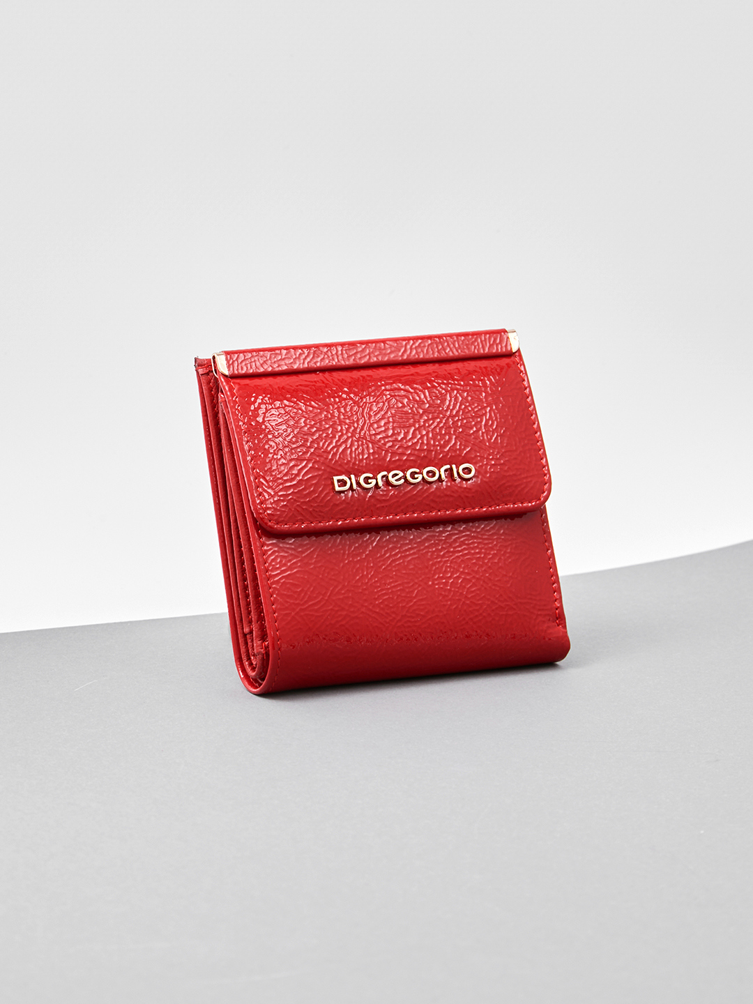 Мини-кошелёк с металлической гравировкой Di Gregorio из лаковой кожи красного цвета