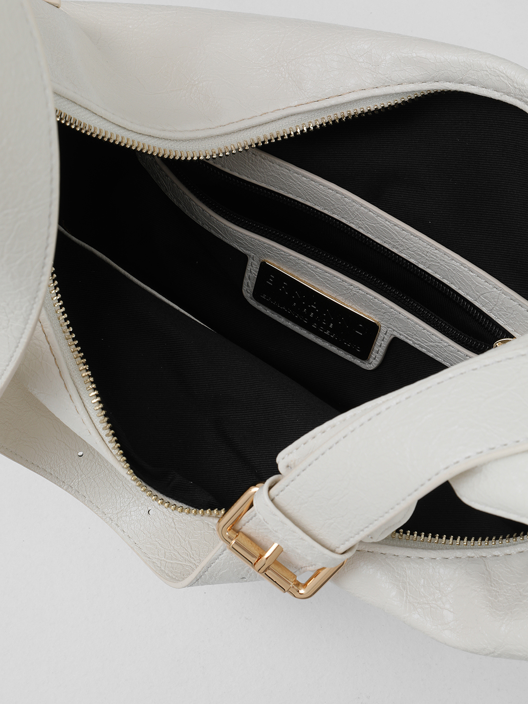 Сумка-хобо в размере L с тонкими боковыми ремнями от ERMANNO FIRENZE в оттенке слоновой кости