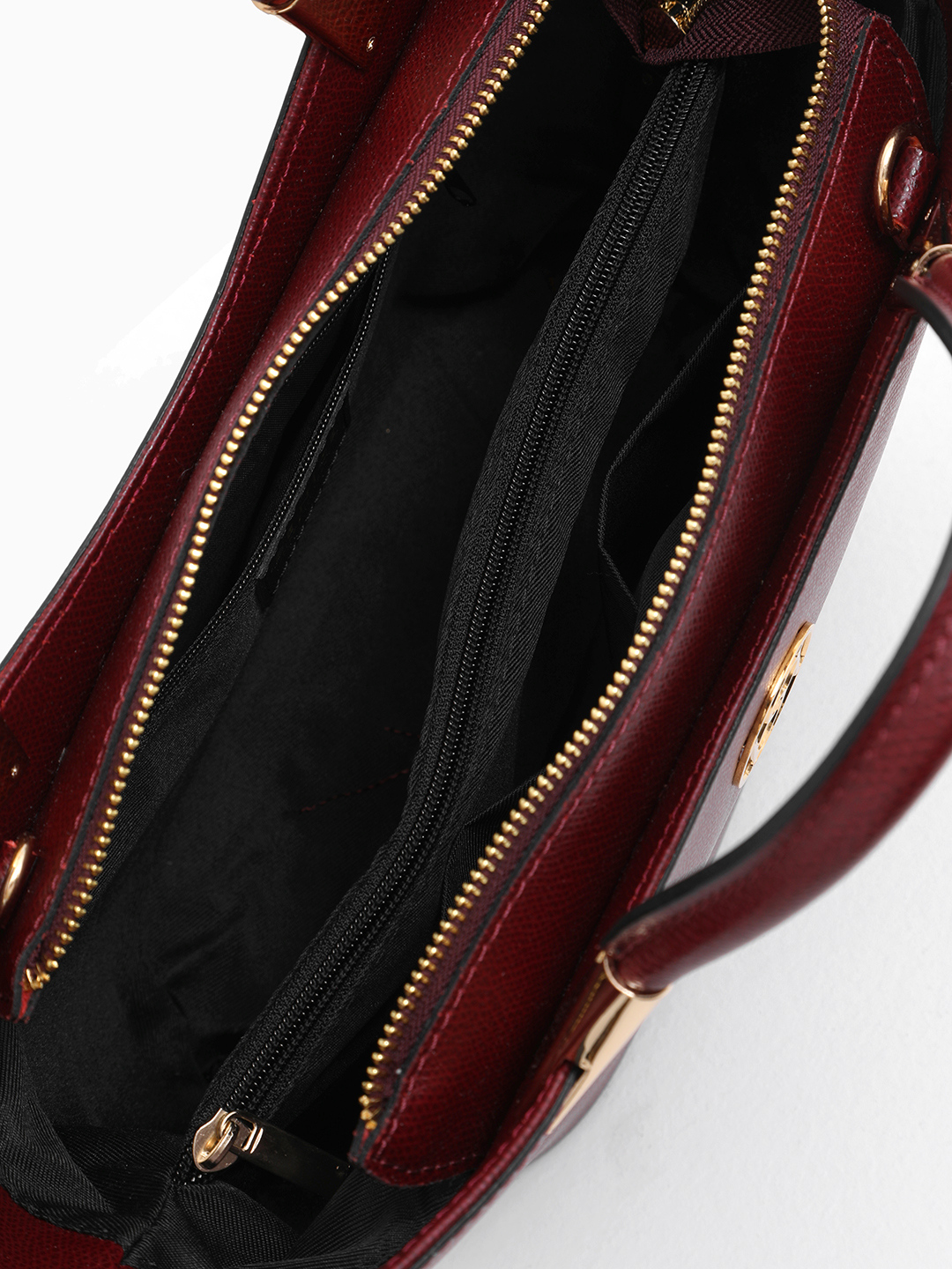 Сумка-лодочка из натуральной кожи бордового цвета с круглой фурнитурой BE NICE